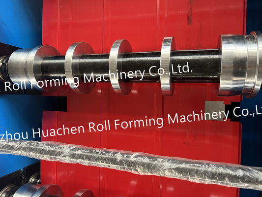 Trilobal metal rolling machine for forming wall panels and roof panels into a trapezoidal shape